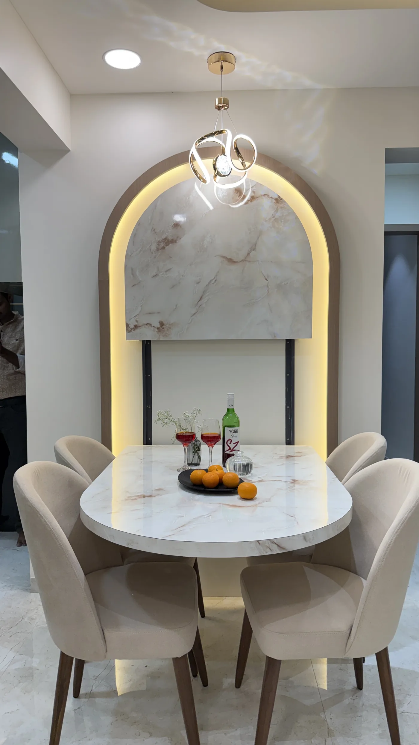 Dining table with arch feature wall